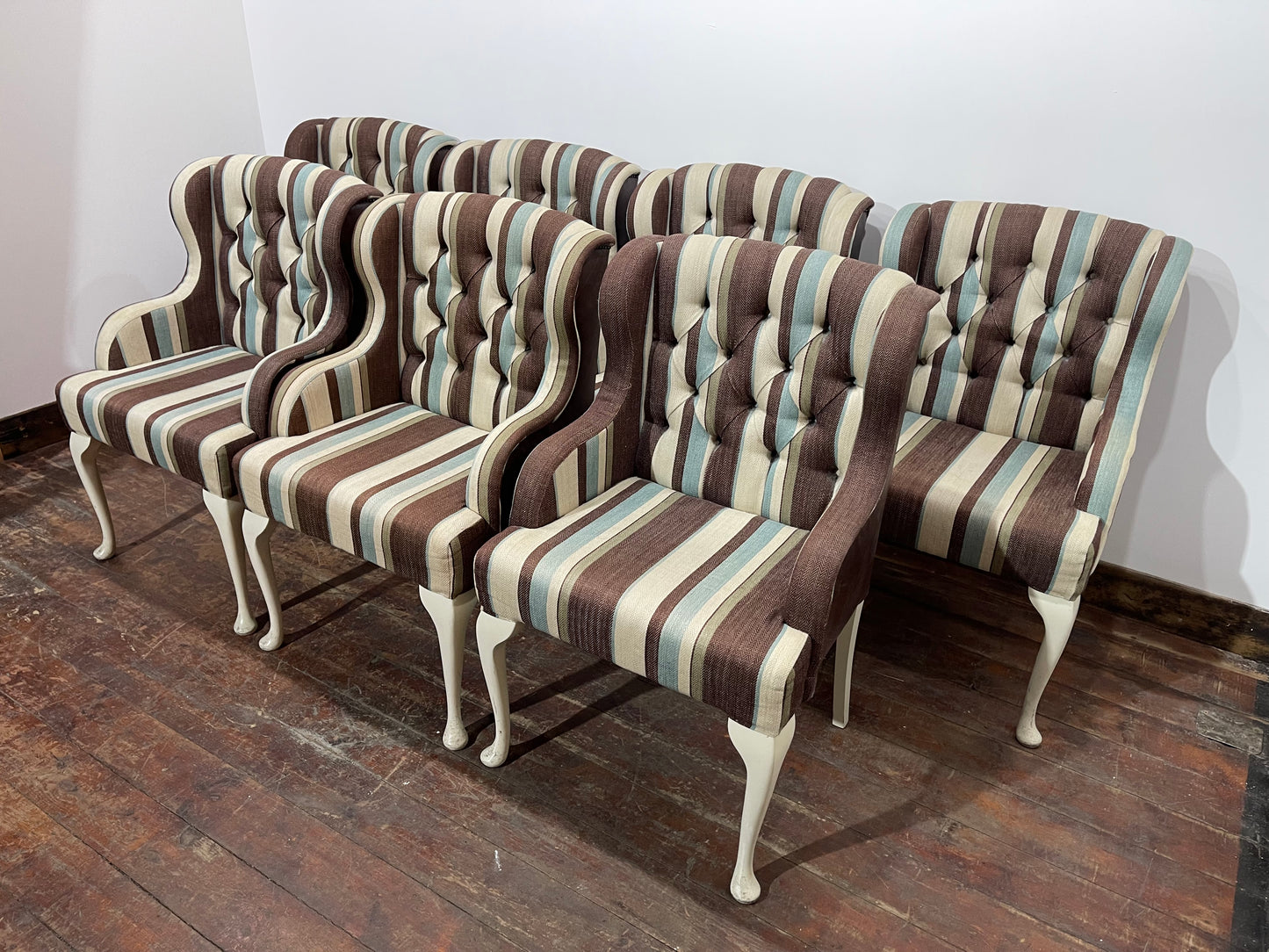 Matching set of 7 Chesterfield style dining chairs in striped fabric