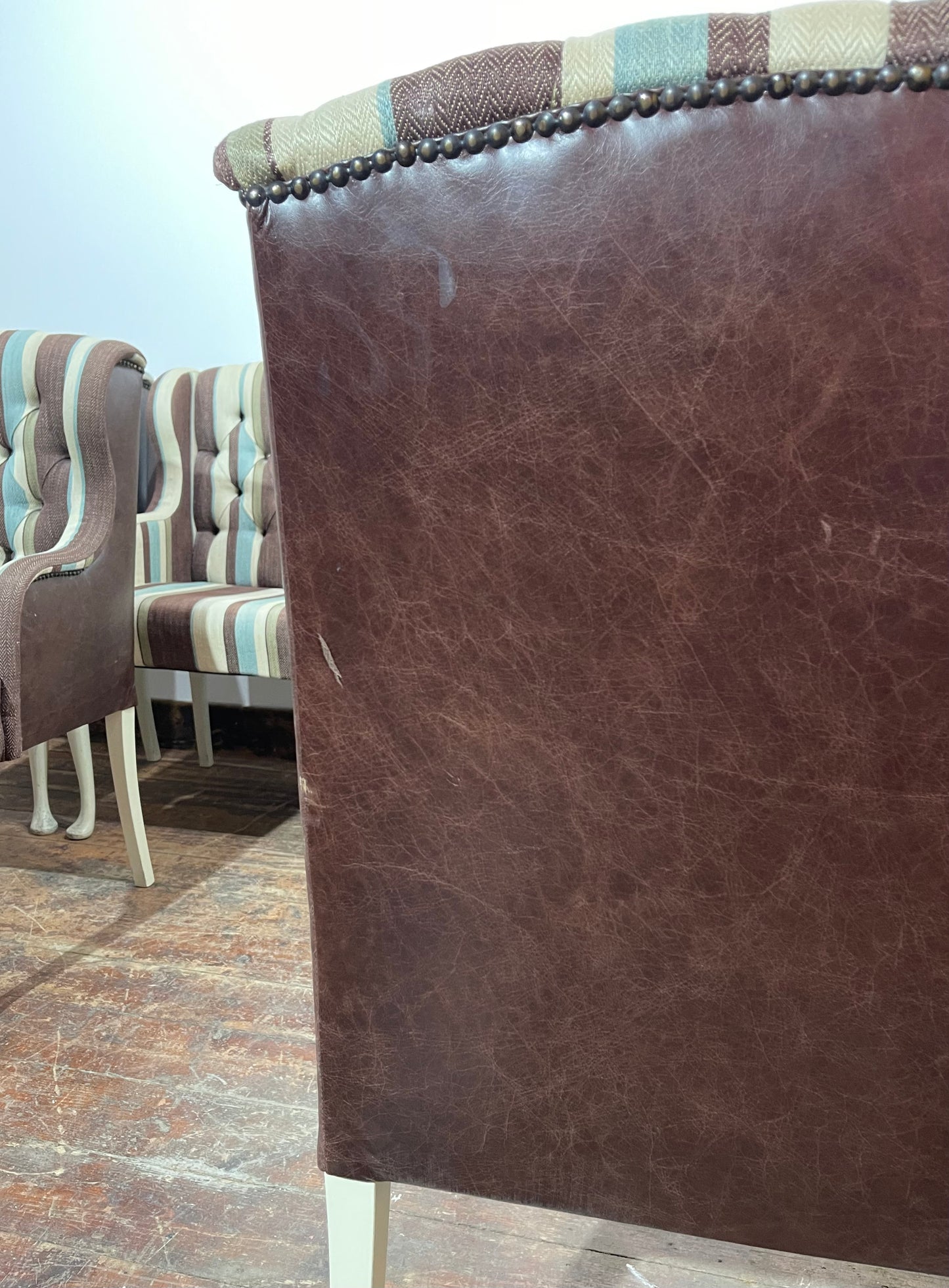 Matching set of 7 Chesterfield style dining chairs in striped fabric