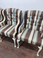 Matching set of 7 Chesterfield style dining chairs in striped fabric