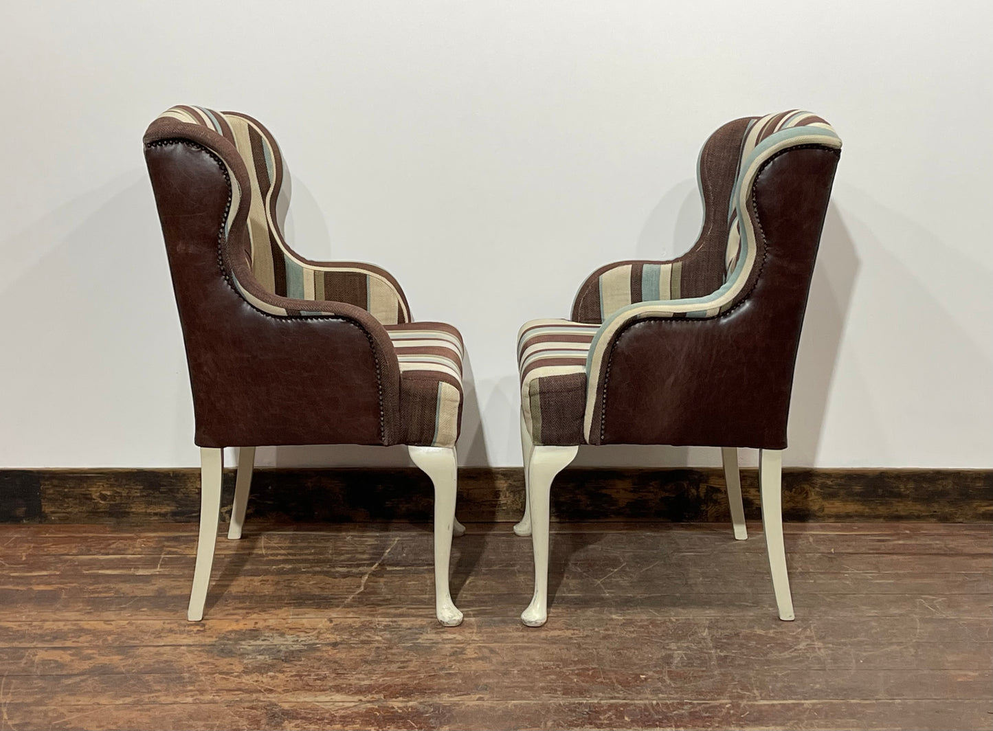 Matching set of 7 Chesterfield style dining chairs in striped fabric