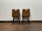 Pair of stylish dining chairs in tan suede-effect fabric