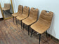 Pair of stylish dining chairs in tan suede-effect fabric