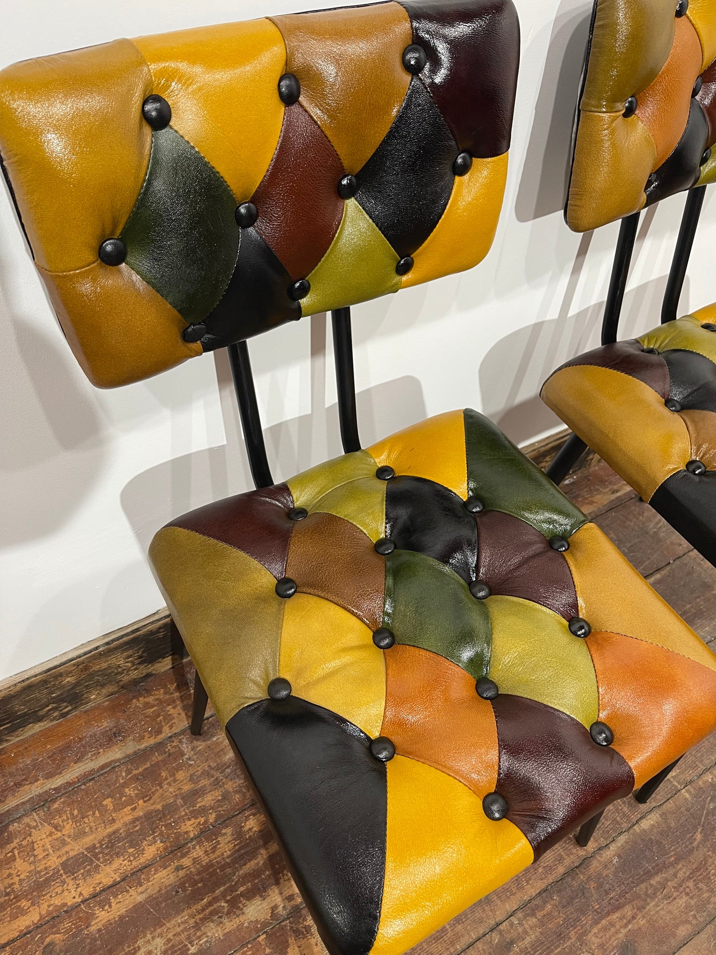 Stunning pair of patchwork leather dining chairs