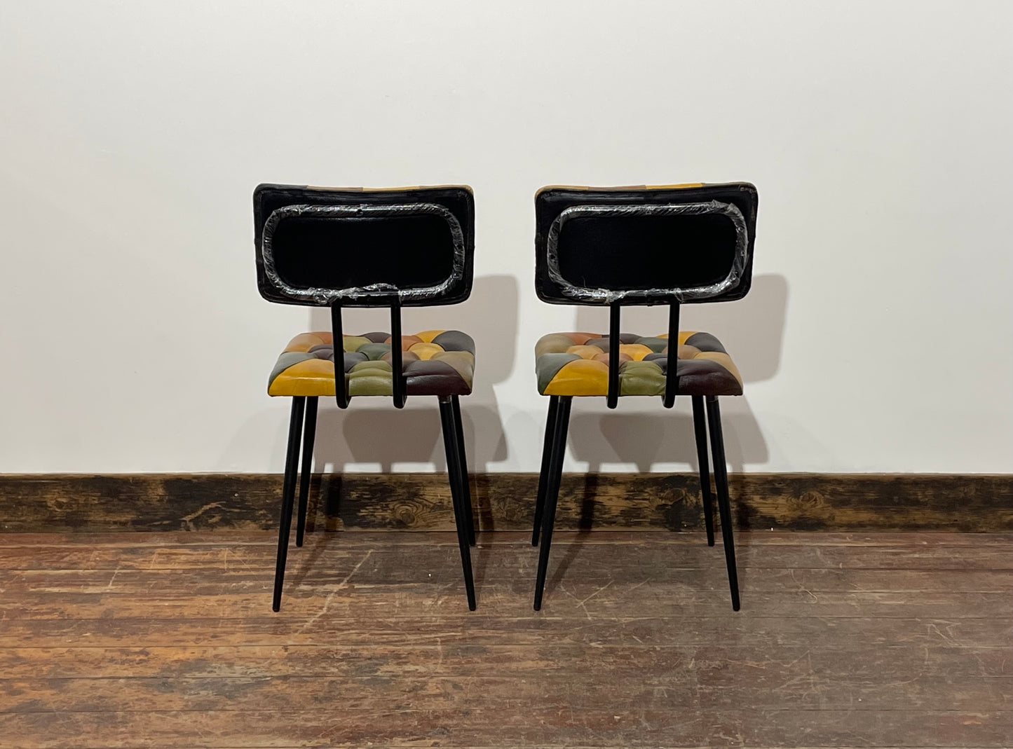Stunning pair of patchwork leather dining chairs