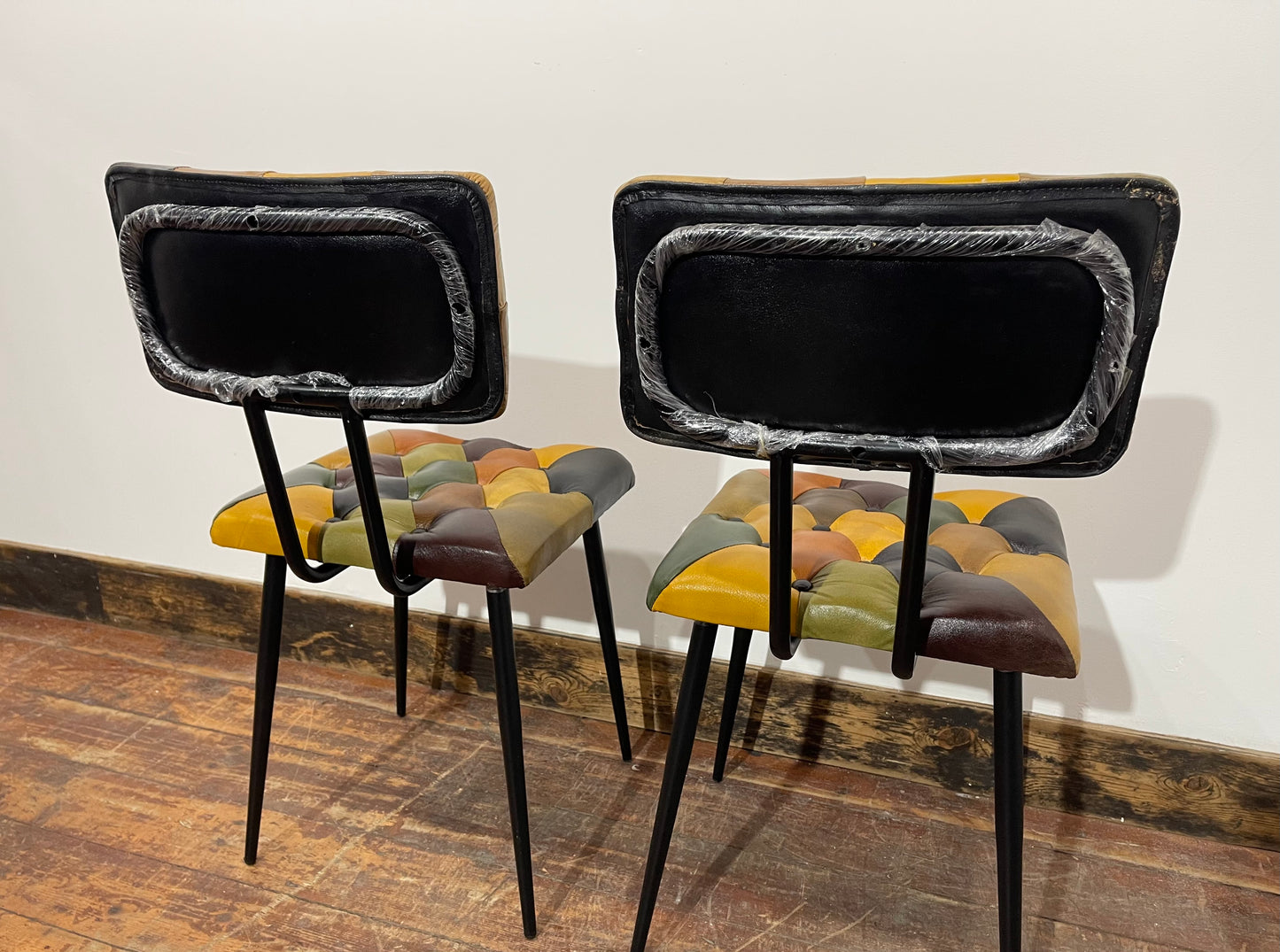 Stunning pair of patchwork leather dining chairs