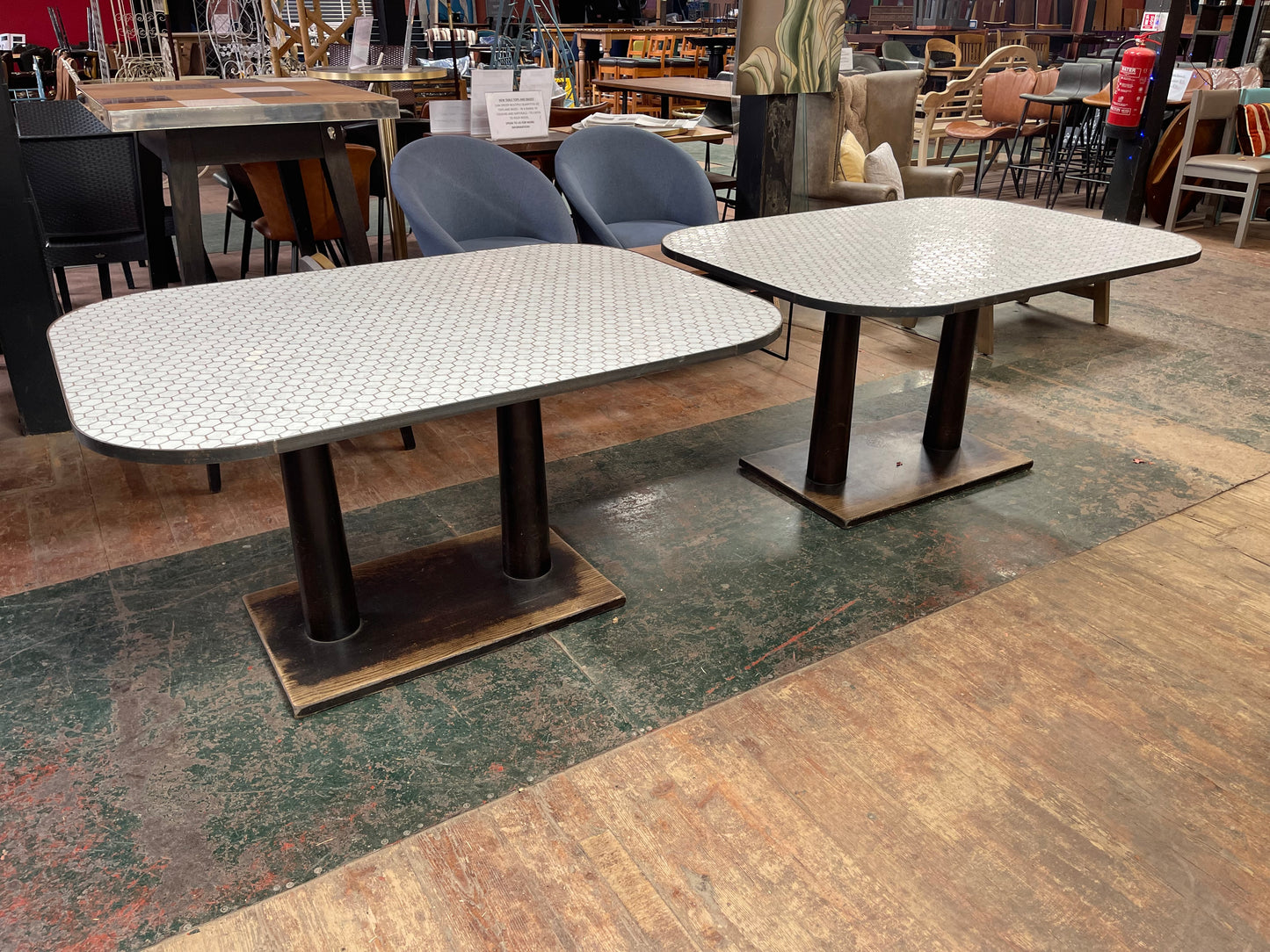 Set of 2 large tables with white marble effect tiles & metal edging