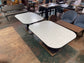 Set of 2 large tables with white marble effect tiles & metal edging
