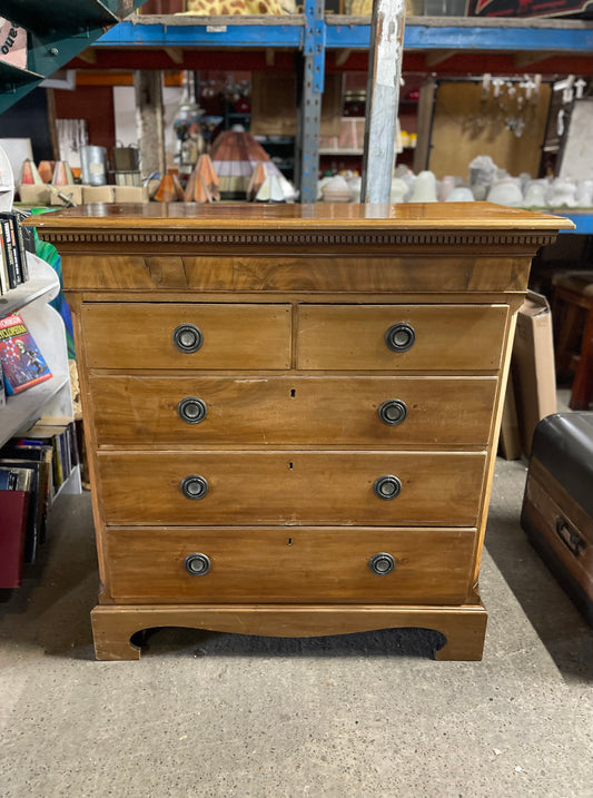 Antique chest of drawers in light wood