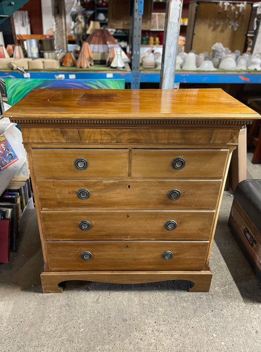 Antique chest of drawers in light wood