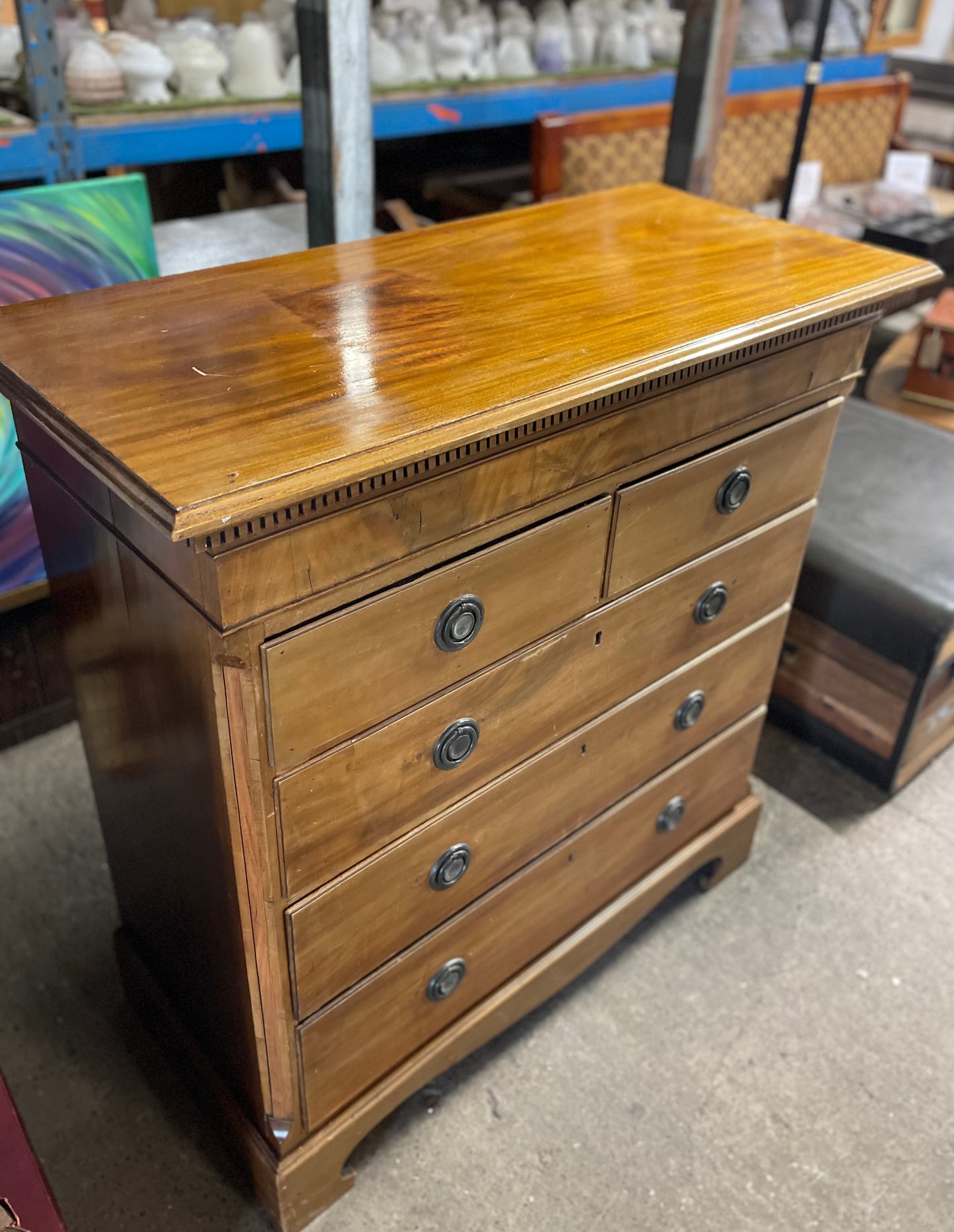 Antique chest of drawers in light wood