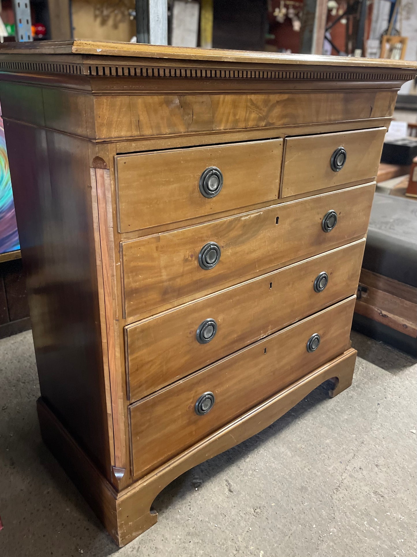 Antique chest of drawers in light wood