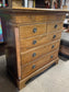 Antique chest of drawers in light wood
