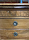 Antique chest of drawers in light wood