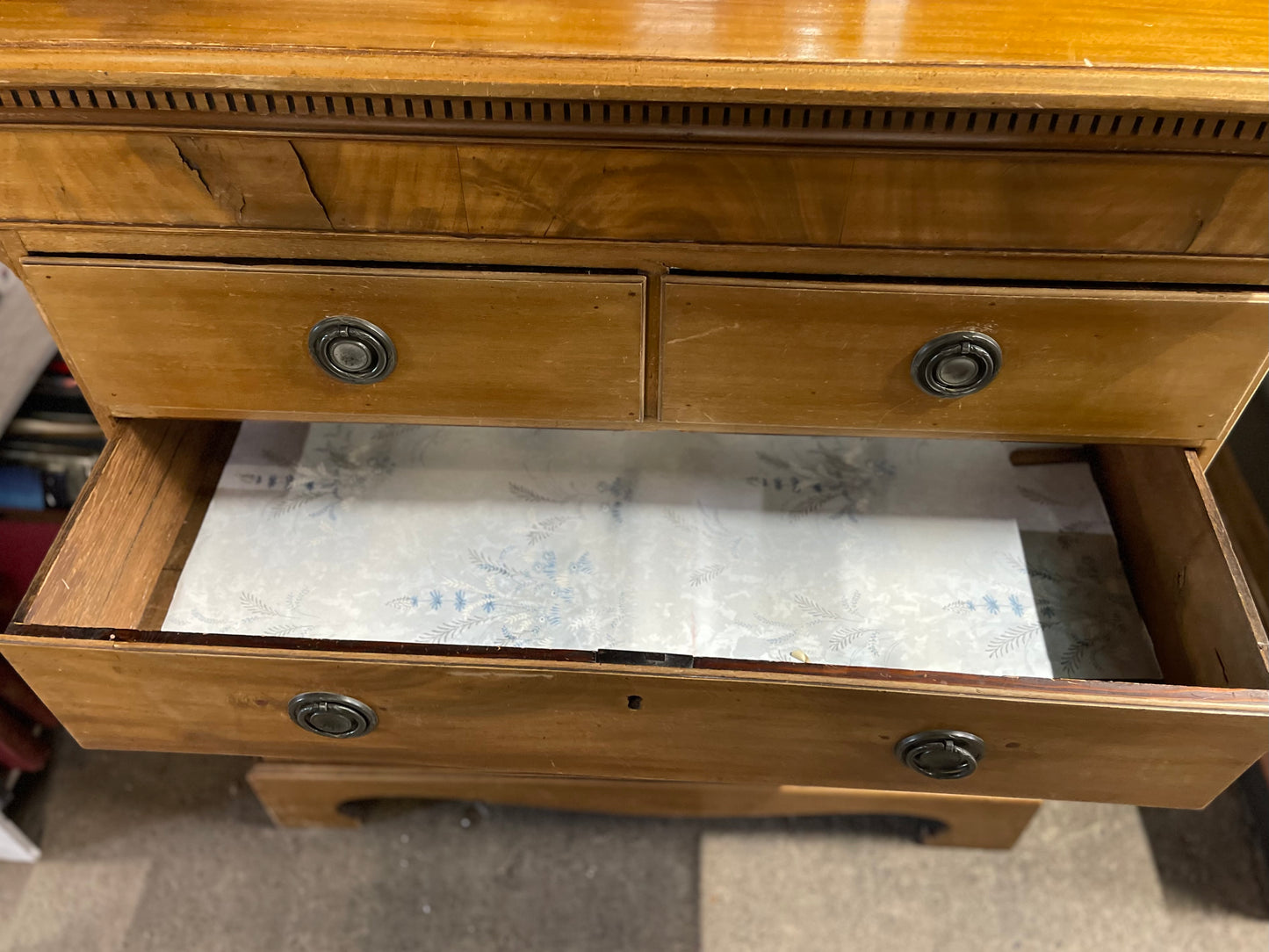 Antique chest of drawers in light wood