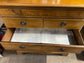 Antique chest of drawers in light wood
