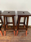 4 bar stools with painted legs