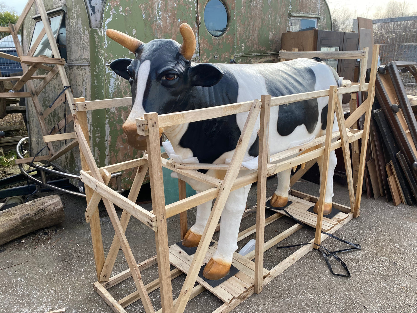 Life-size fiberglass cow statue figure