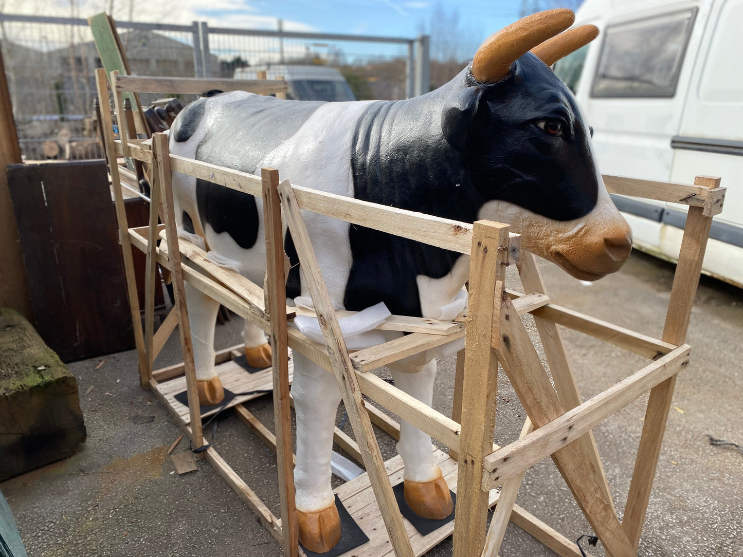 Life-size fiberglass cow statue figure