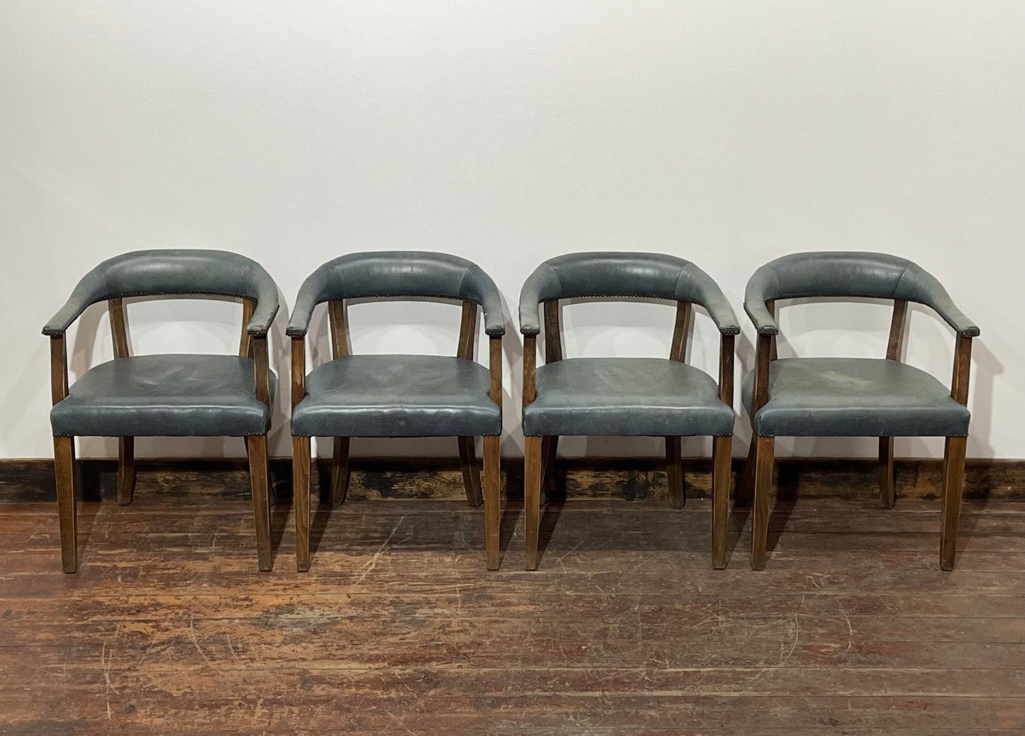 Set of 4 dining chairs with curved backs in light blue / teal leather