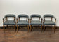 Set of 4 dining chairs with curved backs in light blue / teal leather