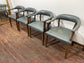 Set of 4 dining chairs with curved backs in light blue / teal leather
