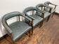 Set of 4 dining chairs with curved backs in light blue / teal leather