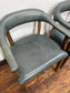 Set of 4 dining chairs with curved backs in light blue / teal leather