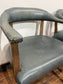 Set of 4 dining chairs with curved backs in light blue / teal leather