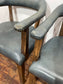 Set of 4 dining chairs with curved backs in light blue / teal leather