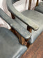 Set of 4 dining chairs with curved backs in light blue / teal leather