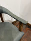 Set of 4 dining chairs with curved backs in light blue / teal leather