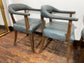 Set of 4 dining chairs with curved backs in light blue / teal leather