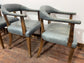 Set of 4 dining chairs with curved backs in light blue / teal leather