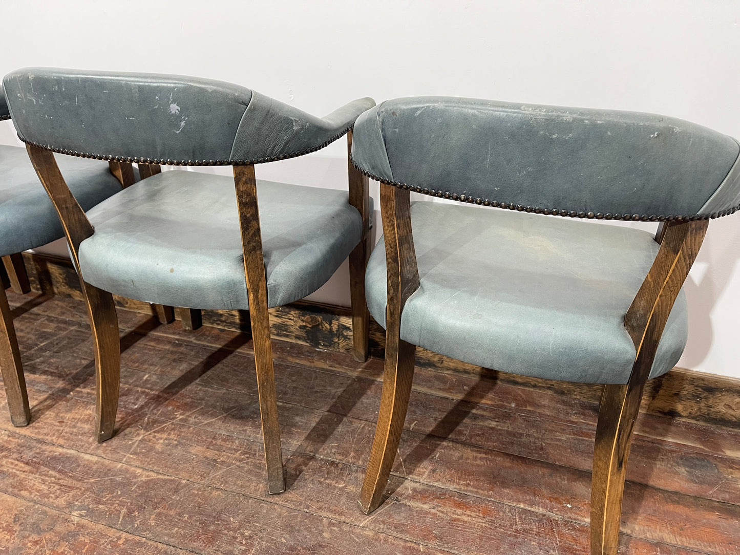 Set of 4 dining chairs with curved backs in light blue / teal leather