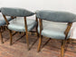 Set of 4 dining chairs with curved backs in light blue / teal leather