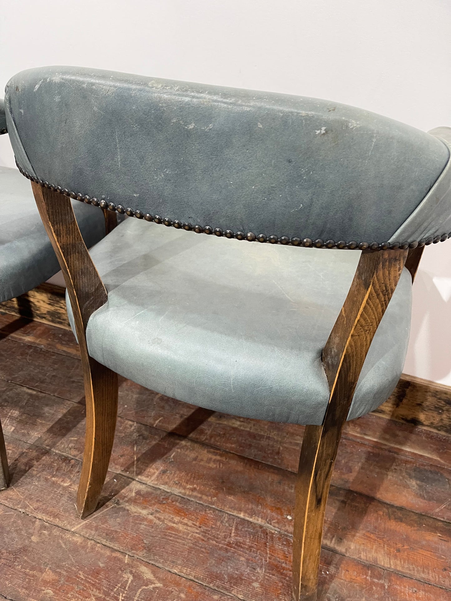 Set of 4 dining chairs with curved backs in light blue / teal leather