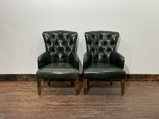 Pair of green leather armchairs with button backs