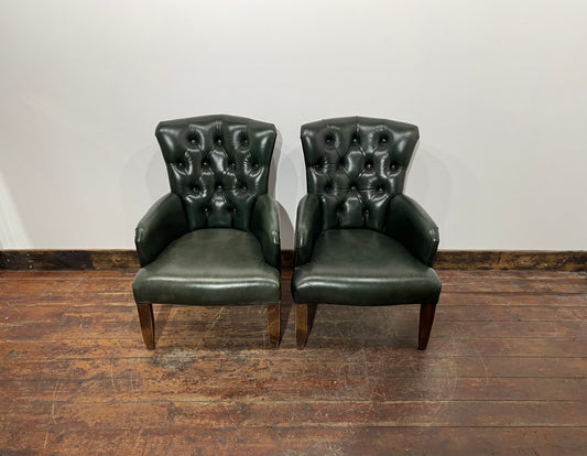 Pair of green leather armchairs with button backs