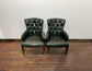 Pair of green leather armchairs with button backs