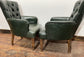 Pair of green leather armchairs with button backs