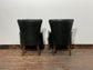 Pair of green leather armchairs with button backs