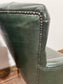 Pair of green leather armchairs with button backs