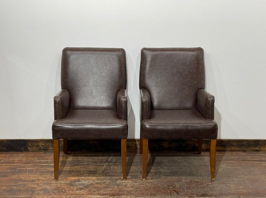 Matching pair of brown faux-leather armchairs