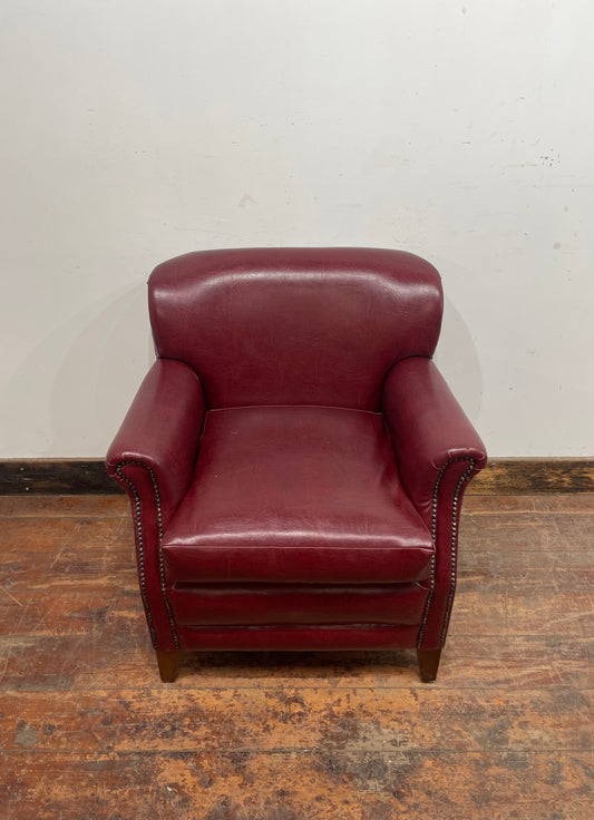 Retro style red leather-effect armchair