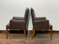 Matching pair of brown faux-leather armchairs