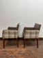 Pair of leather-effect armchairs / pub chairs with check tartan backs