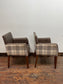Pair of leather-effect armchairs / pub chairs with check tartan backs