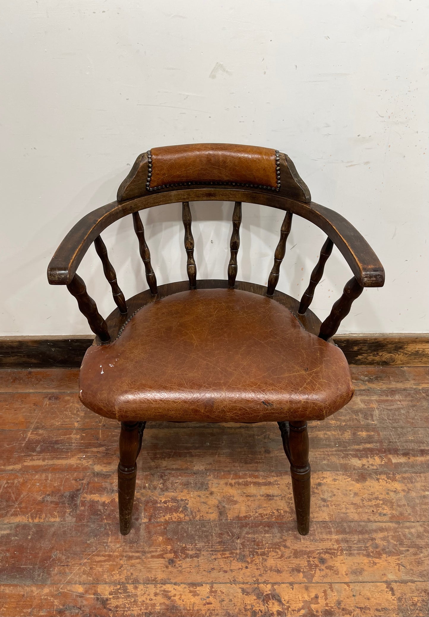 Vintage style spindle back chair with leather upholstery