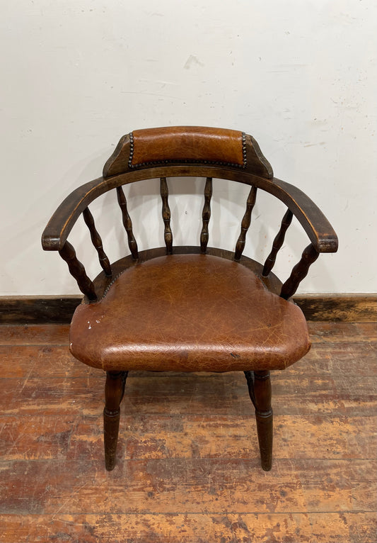 Vintage style spindle back chair with leather upholstery