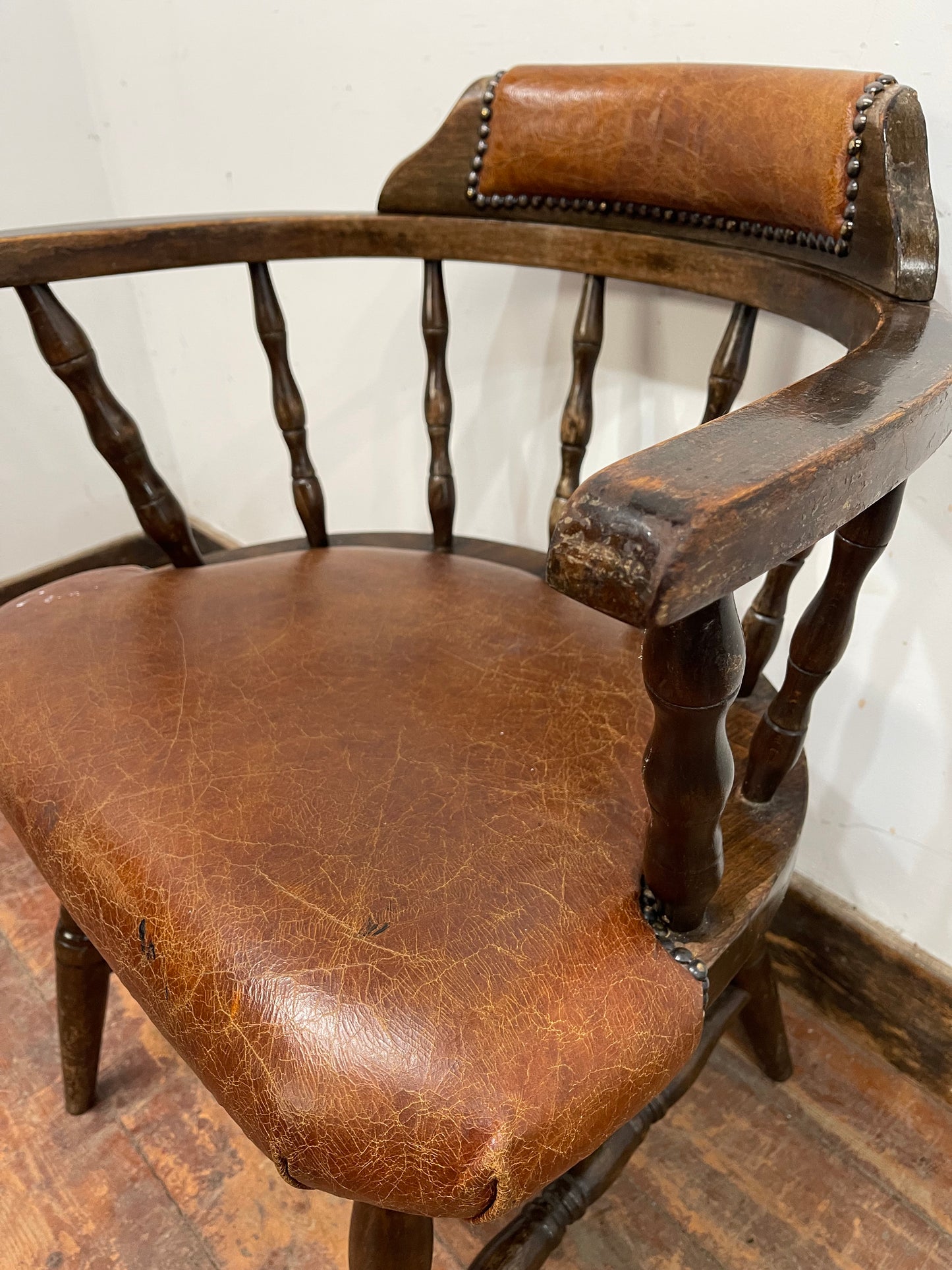 Vintage style spindle back chair with leather upholstery